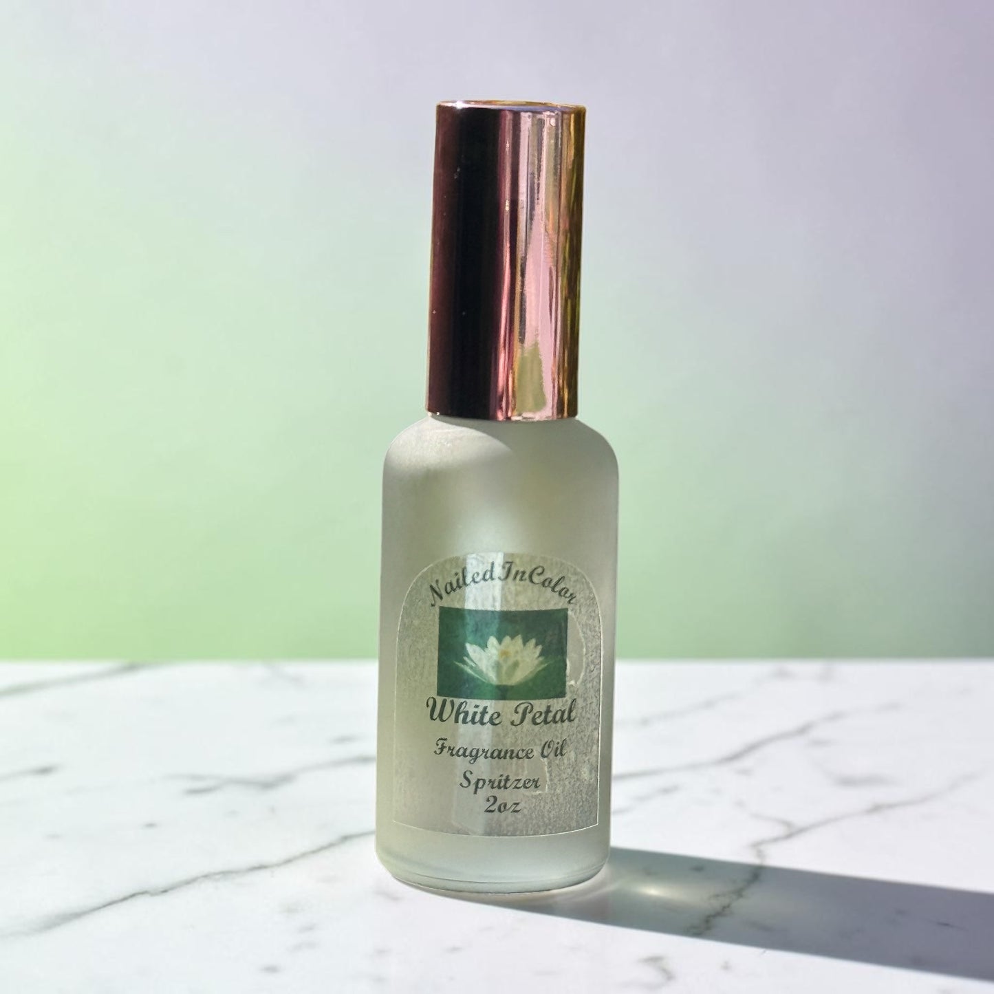 White Petal soft floral body mist bottle on pastel background”