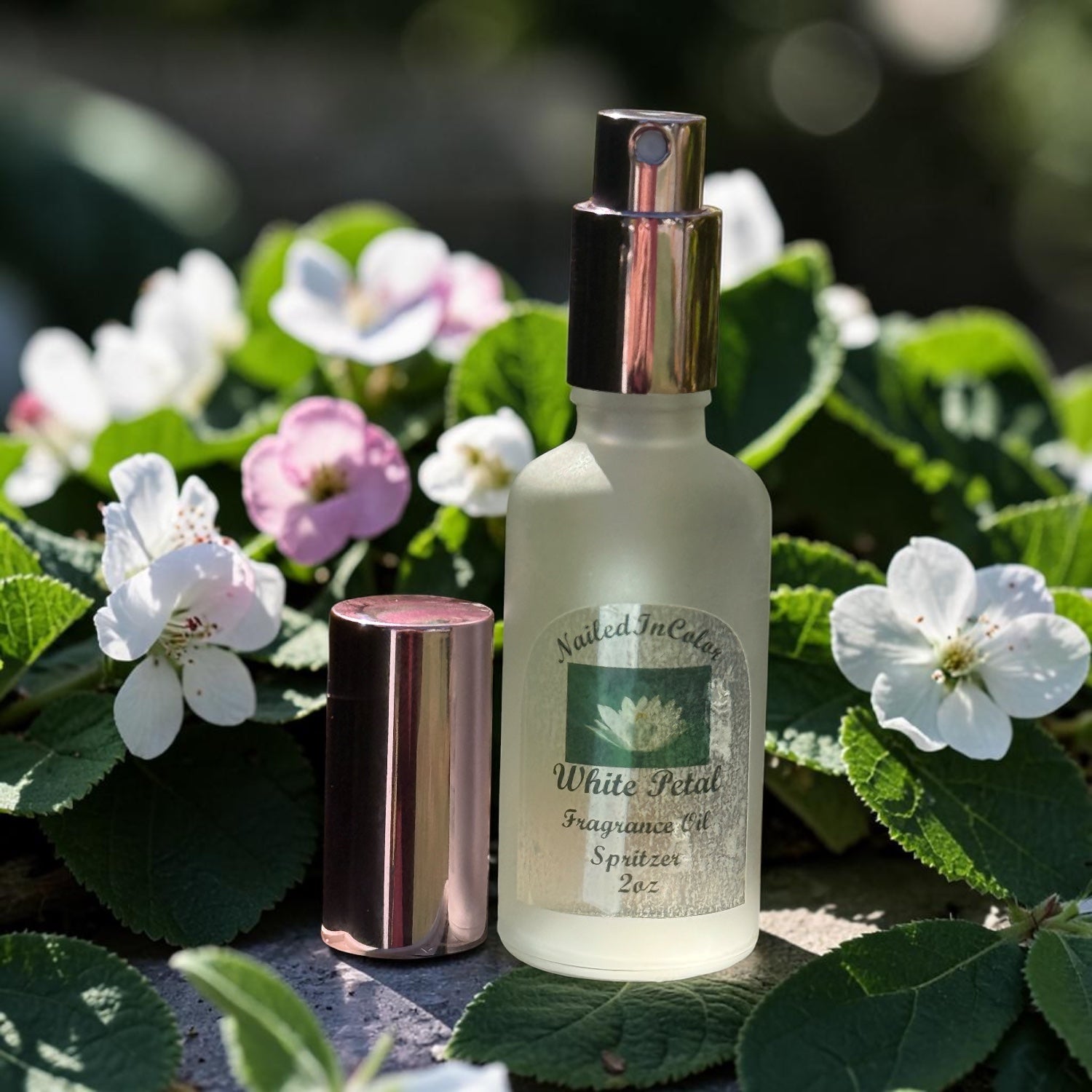 White Petal soft floral body mist bottle on dark background with flowers