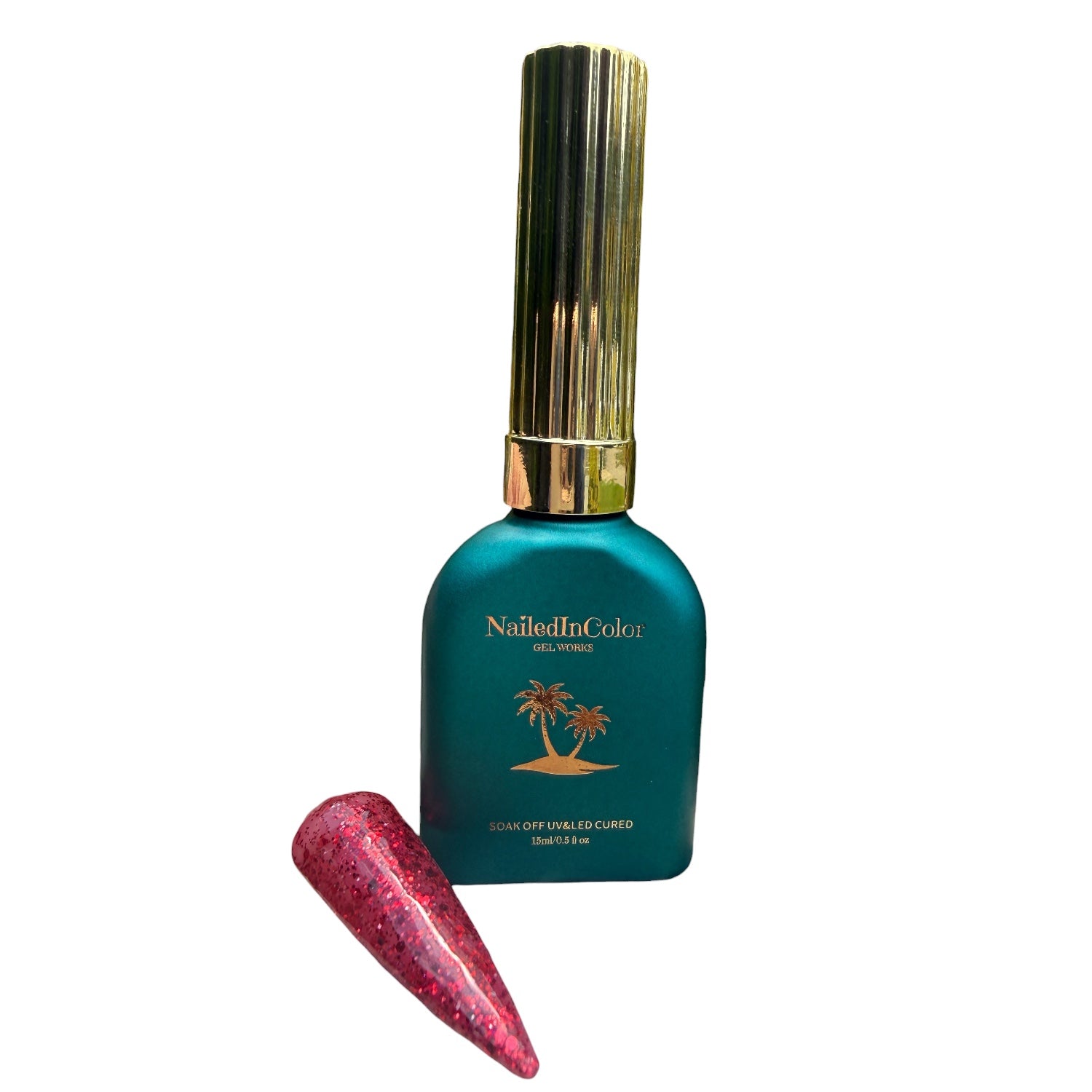 Teal nail polish bottle with gold cap and red glittery nail swatch on a white background