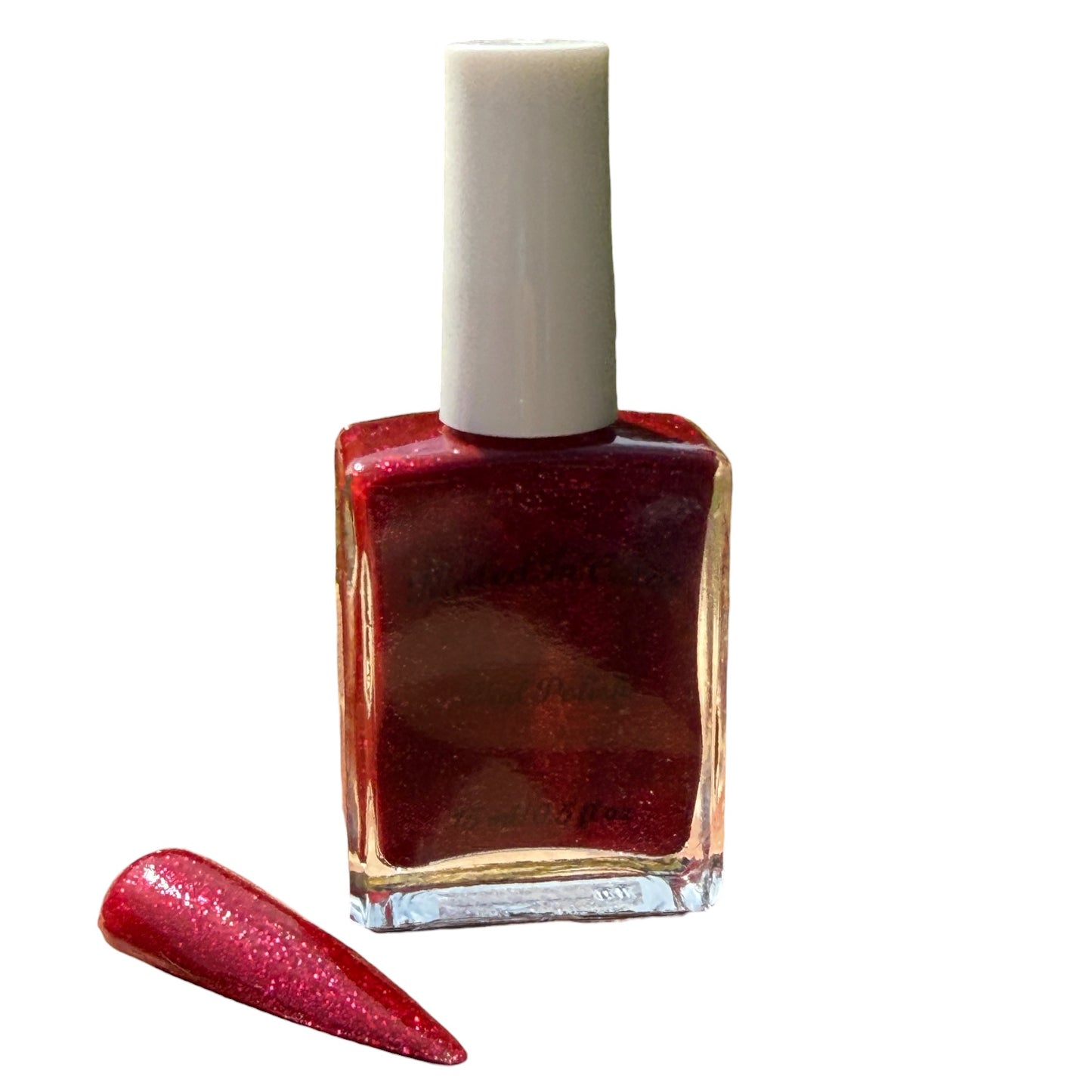 Red glittery nail polish bottle with a matching nail swatch on a white background