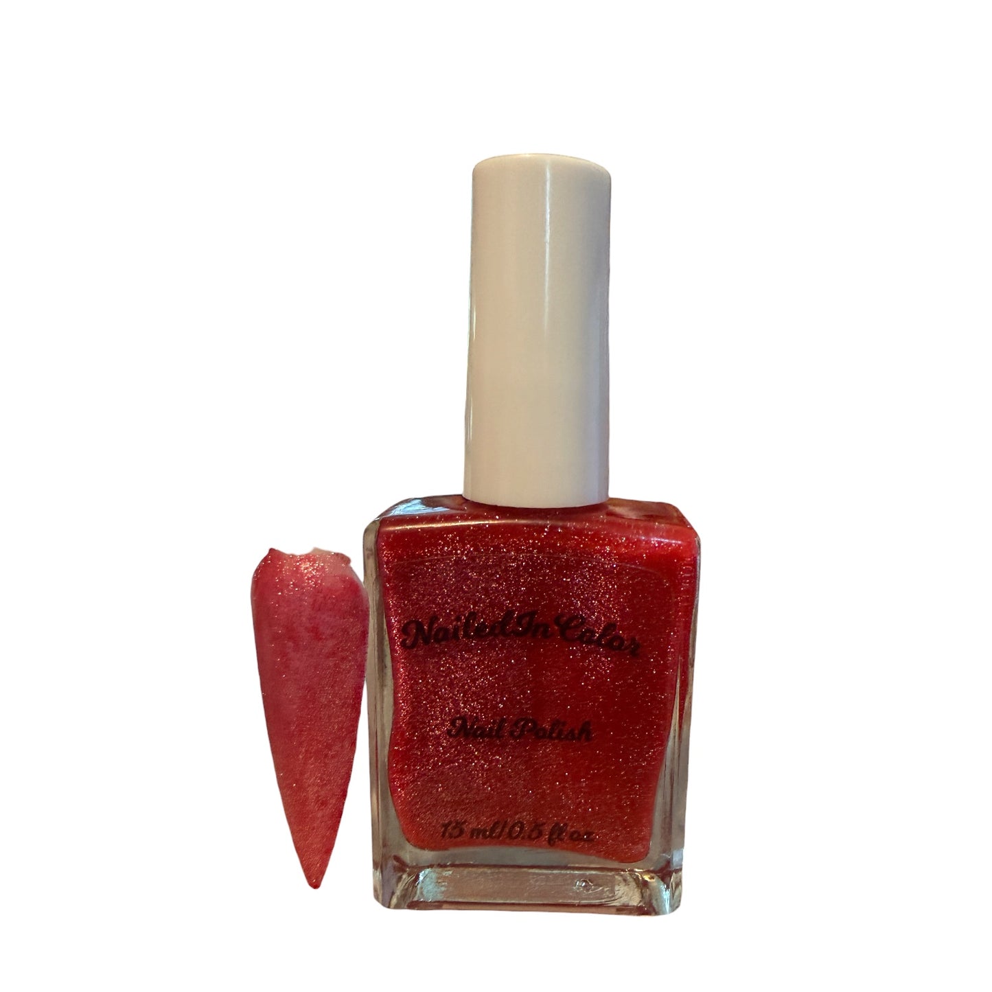 Pink glitter nail polish bottle with a white cap on a white background with pink nail tip