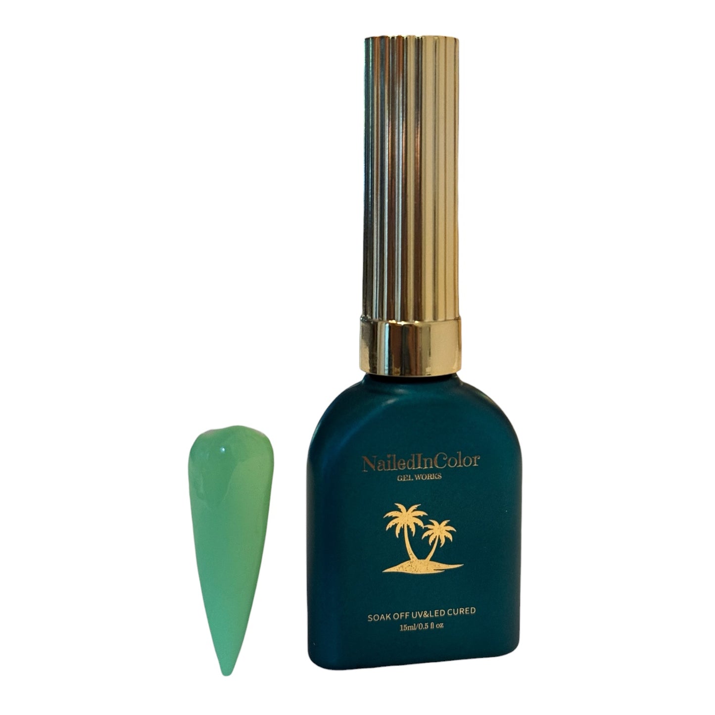 Teal green polish bottle with a gold cap and a light green nail tip on a white background