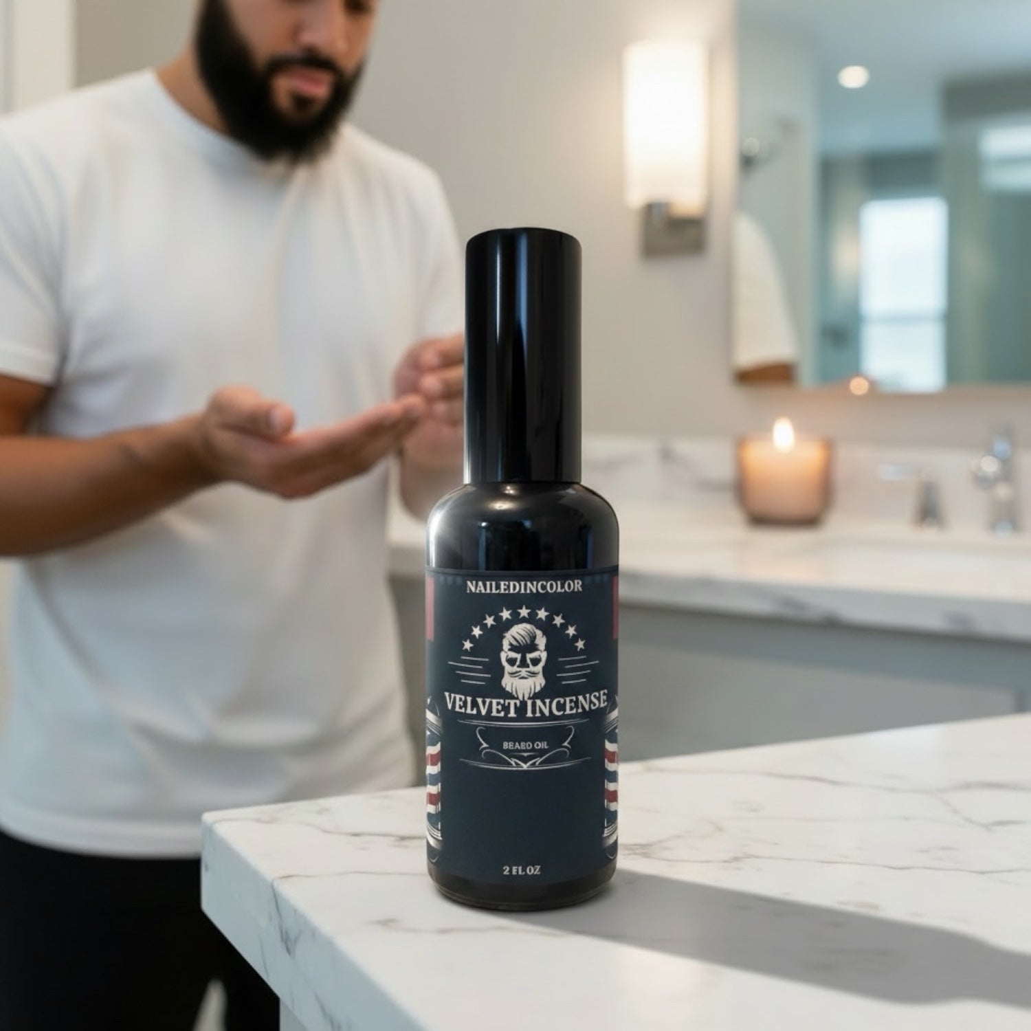 A bottle of NailedInColor Velvet Incense beard oil in stands on a white marble countertop in a bathroom setting, with a blurred man in a white t-shirt standing in the background near a lit candle